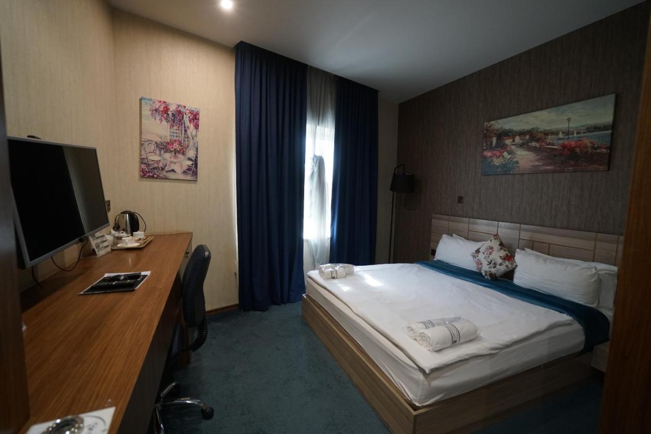 Gratus Hotel เอร์เบล ภายนอก รูปภาพ